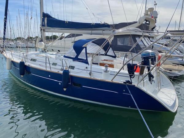 Beneteau Oceanis 411 Celebration 2003 Beneteau Oceanis 411 Celebration sailboat docked in marina.