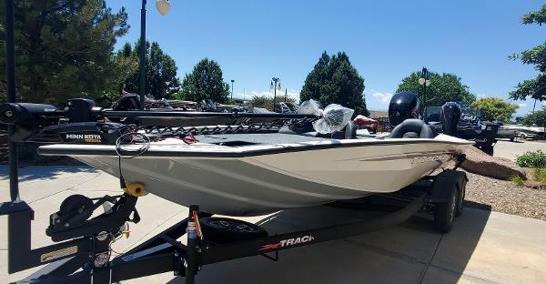 Tracker Pro Team 195 TXW Tournament Edition 2024 Tracker Pro Team 195 TXW Tournament Edition fishing boat on trailer.