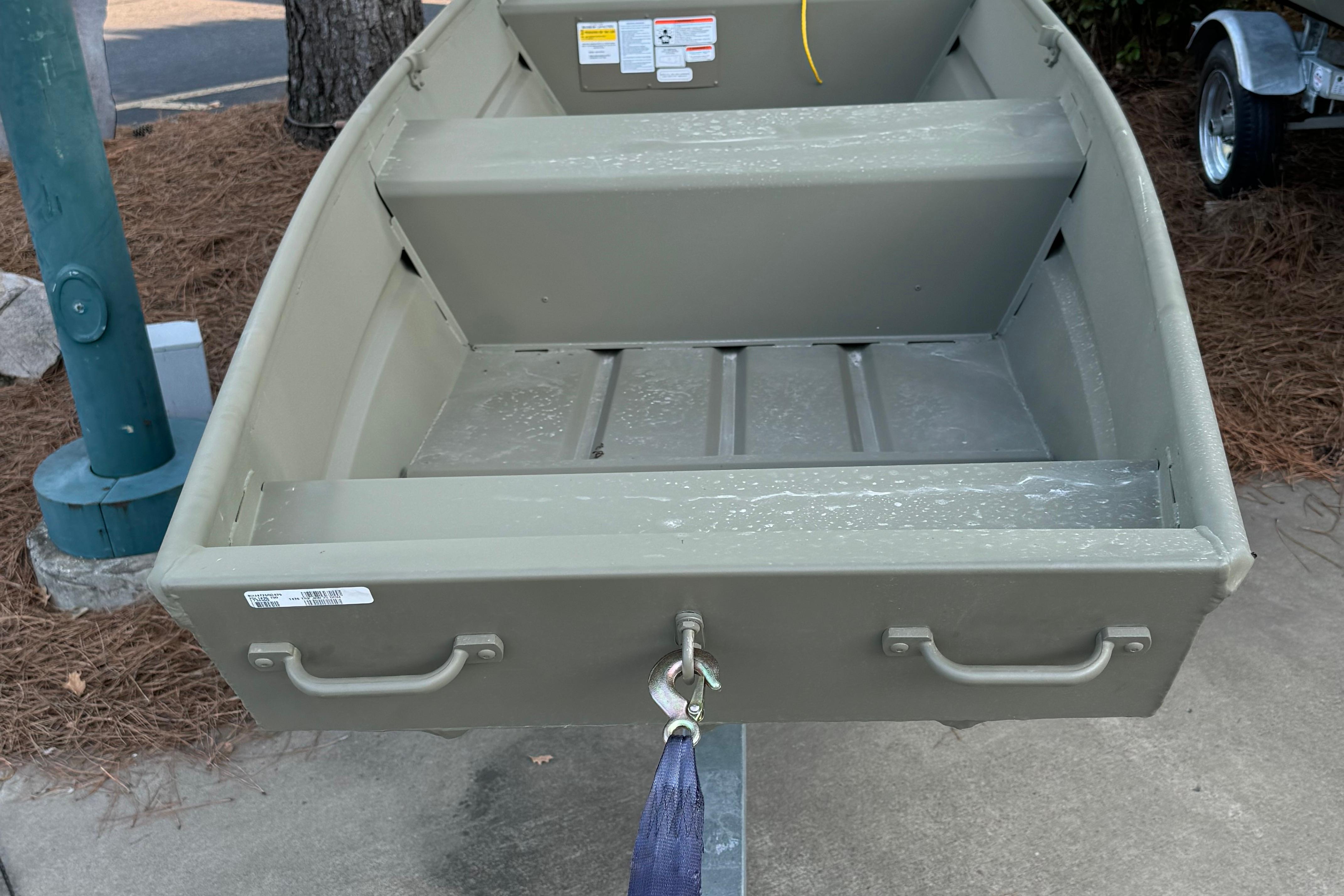 Tracker Grizzly 14 Jon 2026 Tracker Grizzly 14 Jon boat on trailer, parked outdoors.