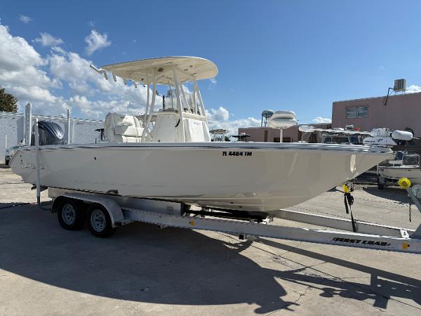 Pathfinder 2400 Open 2023 Pathfinder 2400 Open boat on trailer under clear blue sky.