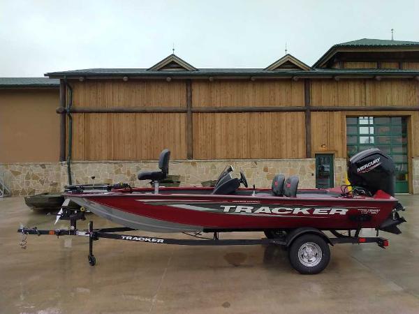 Tracker Pro Team 175 Crappie Edition 2025 Tracker Pro Team 175 Crappie Edition boat on trailer, parked outdoors.