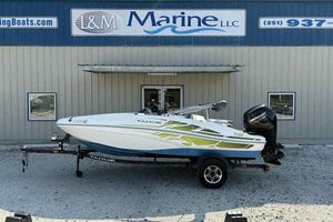 Tahoe T16 2022 Tahoe T16 boat on trailer outside L&M Marine dealership.