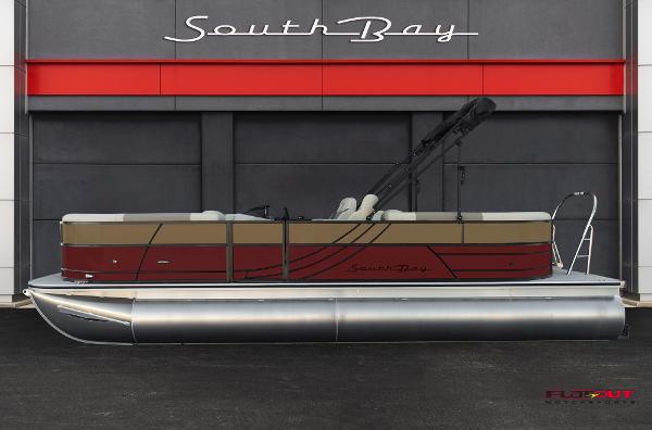 South Bay RearSeating 200hp 2023 South Bay RearSeating 200hp pontoon boat in front of dealership.
