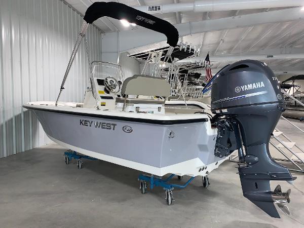Key West 188 Bay Reef 2024 Key West 188 Bay Reef boat with Yamaha outboard motor in showroom.