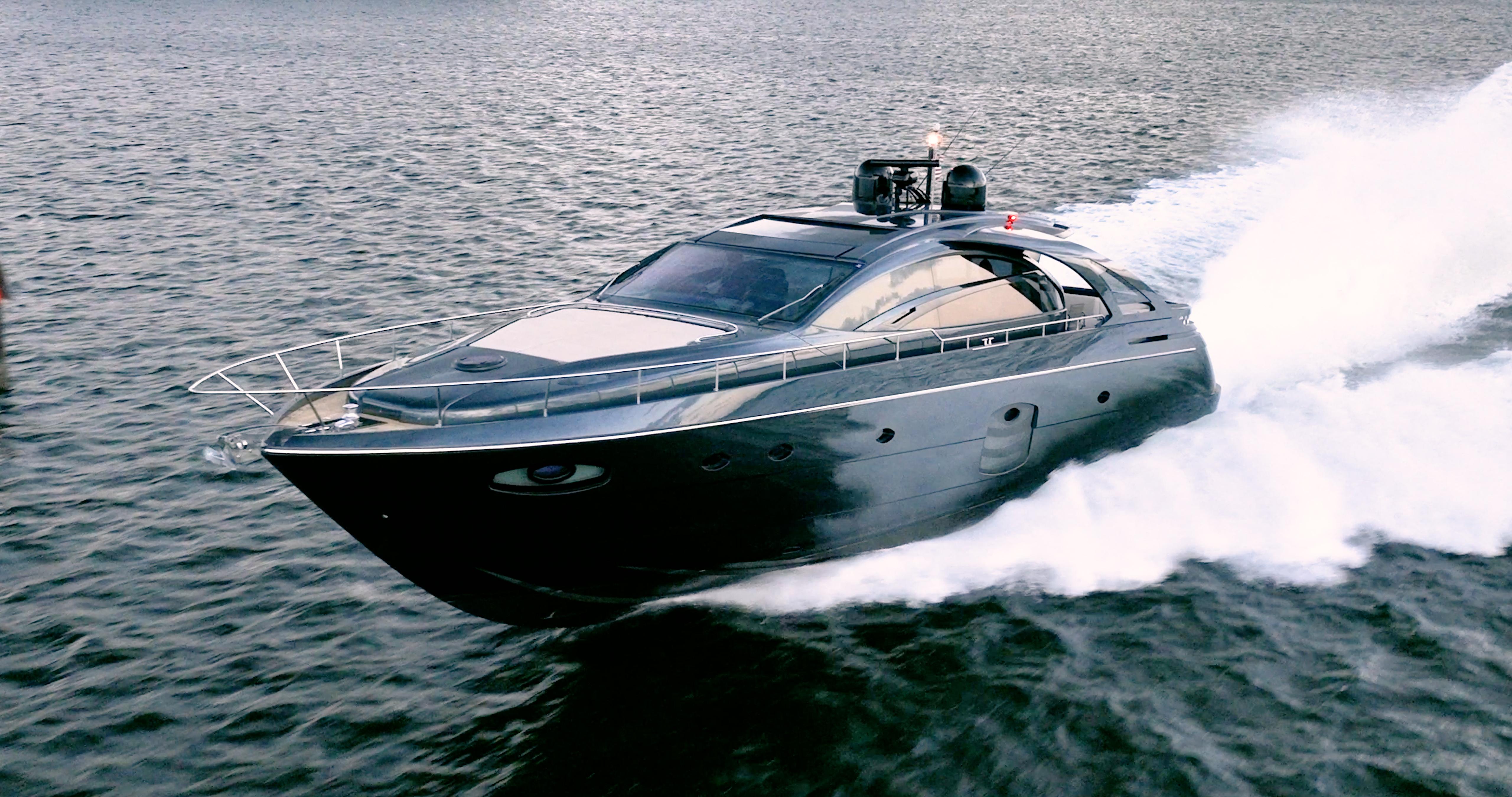 Pershing 70 Luxurious 2017 Pershing 70 yacht cruising swiftly on open water.
