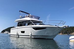 Jeanneau Velasco 37F 2019 Jeanneau Velasco 37F yacht on calm water, clear sky background.