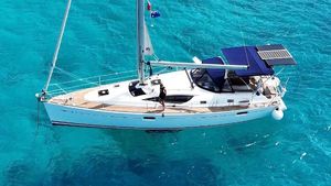 Jeanneau Sun Odyssey 42 DS 2009 Jeanneau Sun Odyssey 42 DS sailing on clear turquoise water.