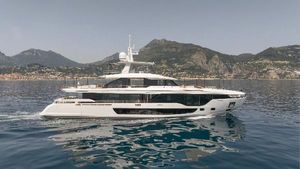 Azimut Azimut Grande 36m 2023 Azimut Grande 35m yacht cruising on calm waters with mountainous backdrop.