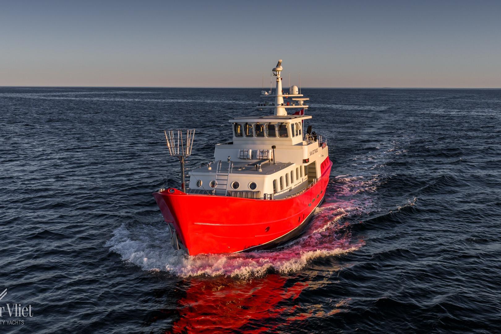 Altena Trawler Red Altena Trawler yacht cruising on open sea, 2009 model.