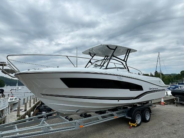Jeanneau Cap Camarat 7.5WA Series 3 2024 Jeanneau Cap Camarat 7.5WA Series 3 boat on trailer, dockside view.