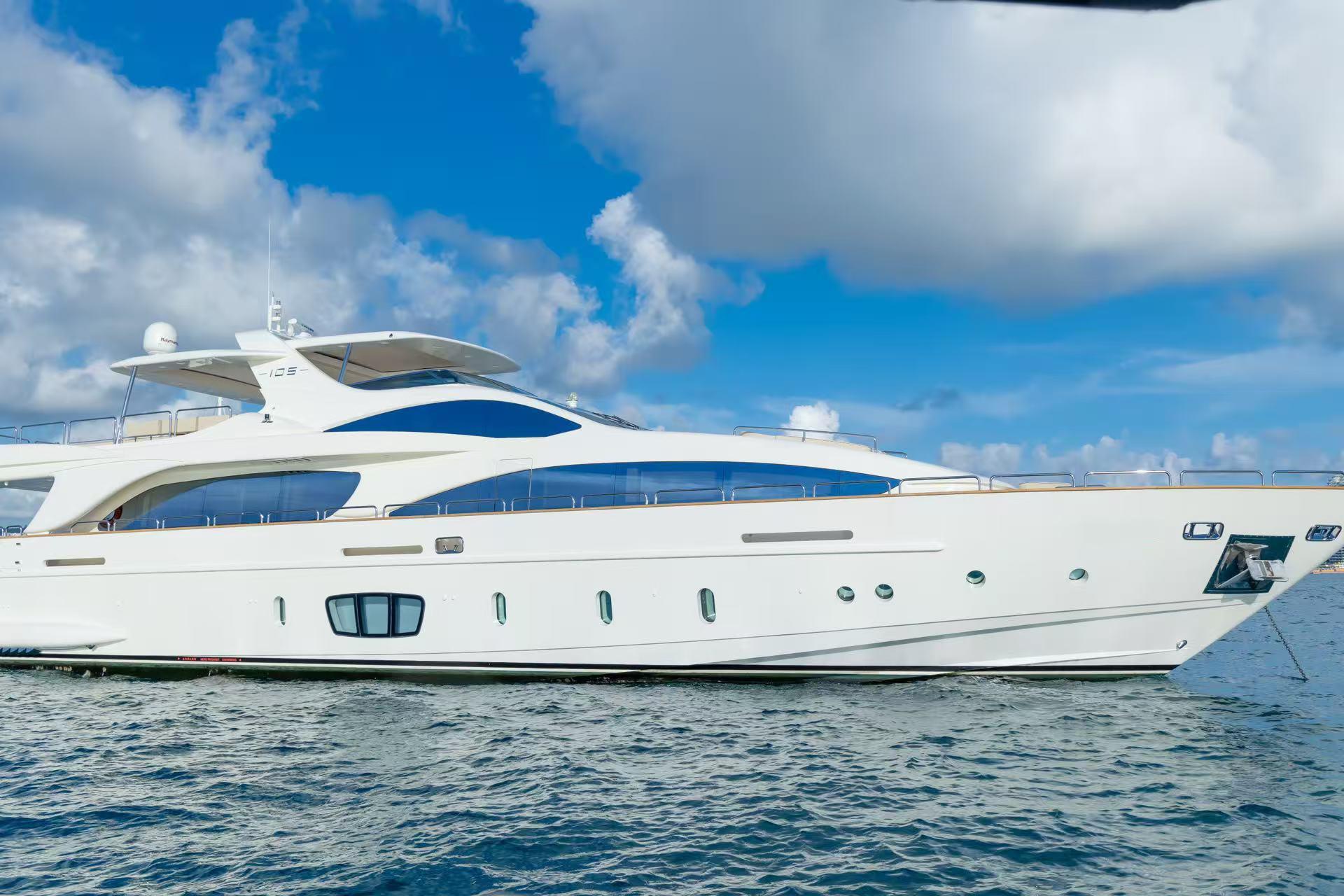 Azimut 105 Luxury Azimut 105 yacht from 2010 on open water under blue sky.