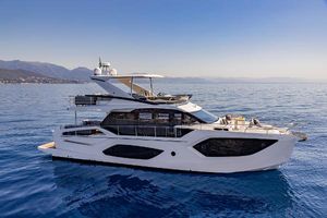Absolute 56 FLY Luxury Absolute 56 FLY yacht cruising on serene blue waters, 2025 model.