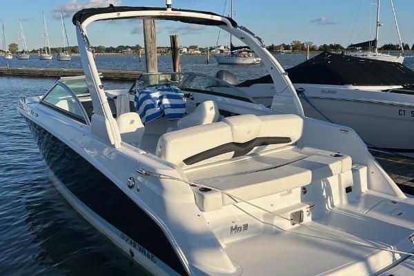 Four Winns HD3 HD3 2022 Four Winns HD3 OB RS boat docked in a marina.
