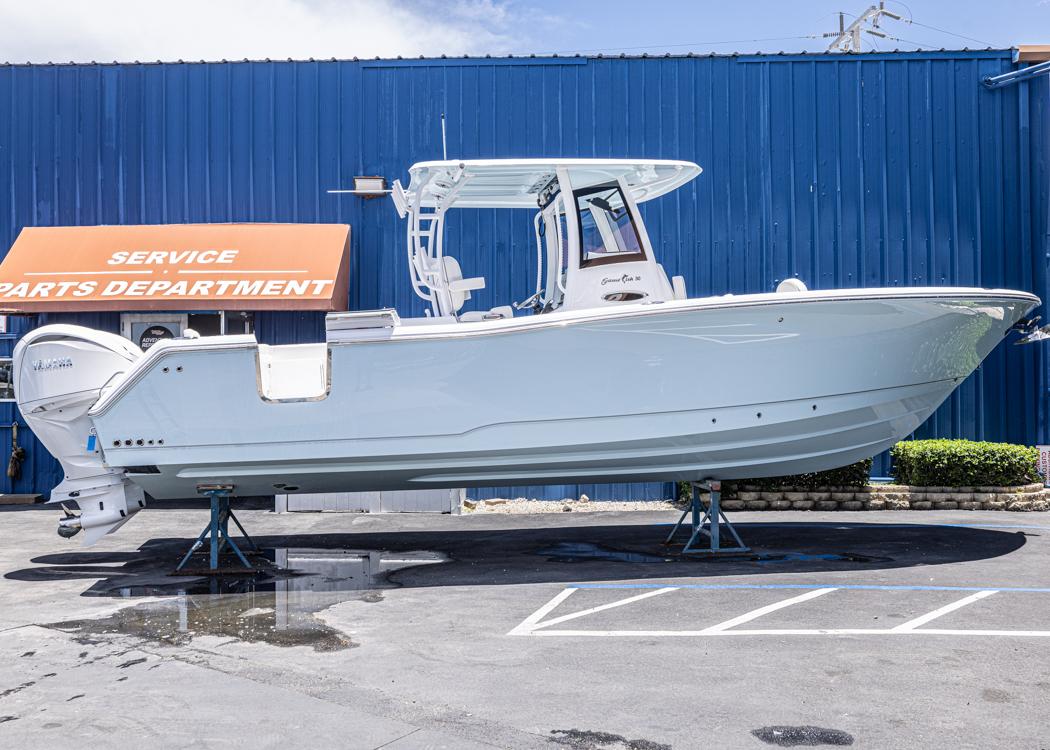 Sea Hunt Gamefish 30 Forward Seating 2026 Sea Hunt Gamefish 30 boat with forward seating, displayed outside service department.