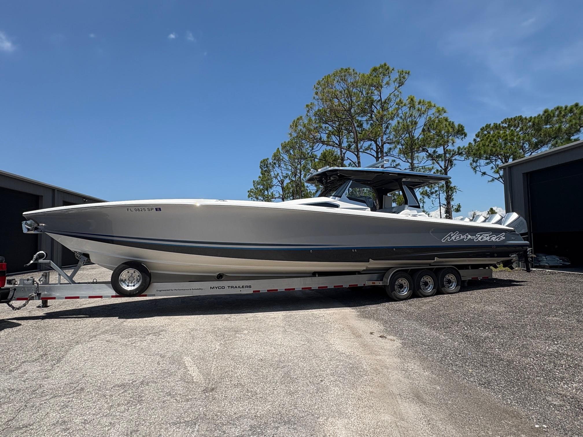 Nor-Tech 450 Sport Center Console 2020 Nor-Tech 450 Sport Center Console boat on trailer, parked outdoors.