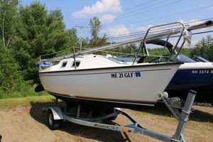 Precision 18 Sailboat on trailer, Precision 18 model, 2018, parked outdoors with trees in background.