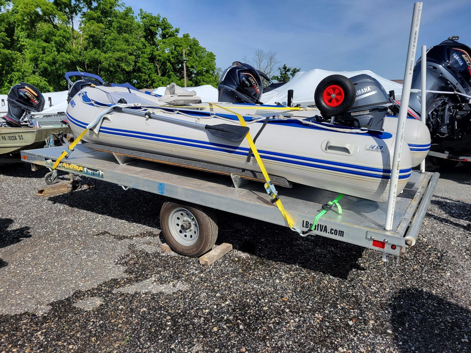 2019 Sea Eagle inflatable 14SR inflatable. 2021 Yamaha 20 hp. Aluminum trailer