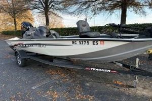 Tracker Pro Team 190 TX Tournament Edition 2021 Tracker Pro Team 190 TX Tournament Edition boat on trailer in parking lot.