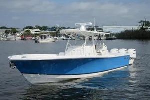 Regulator 34SS 2019 Regulator 34SS boat with blue hull on calm water.