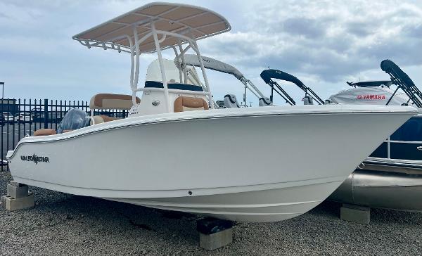 NauticStar 212 Legacy 2025 NauticStar 212 Legacy boat displayed outdoors on gravel.
