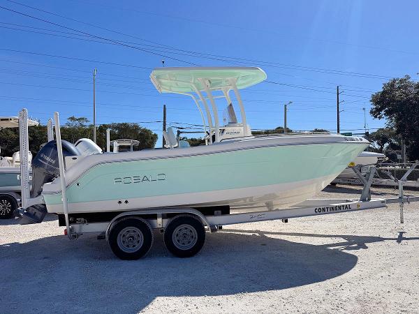 Robalo R222 Center Console 2018 Robalo R222 Center Console boat on trailer, side view, sunny day.
