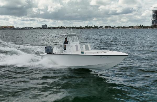 Rambo 27 2024 Rambo 27 boat cruising on open water under cloudy skies.