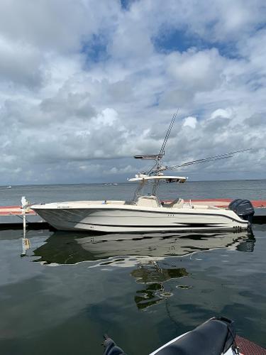 Hydra-Sports Vector 3300 CC 2006 Hydra-Sports Vector 3300 CC boat docked on a calm, cloudy day.