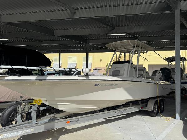 ShearWater 270 Carolina Flare 2017 ShearWater 270 Carolina Flare boat on trailer under shelter.