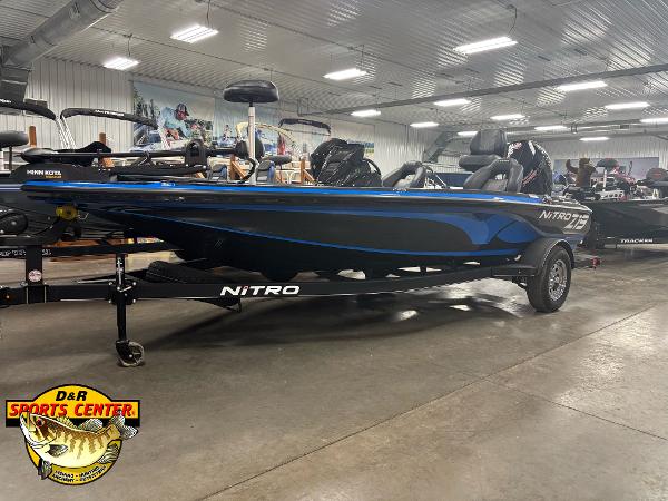 Nitro Z19 2024 Nitro Z19 boat in showroom, blue and black design, displayed at D&R Sports Center.