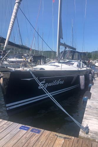 Jeanneau 50 DS 2008 Jeanneau 50 DS sailboat docked, named "Équilibre," with clear blue sky background.