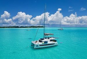 Bali 4.6 OPEN SPACE 2021 Bali 4.6 OPEN SPACE catamaran sailing on turquoise waters under a clear blue sky.