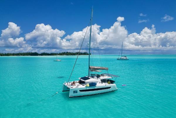 Bali 4.6 OPEN SPACE 2021 Bali 4.6 OPEN SPACE catamaran sailing on turquoise waters under a clear blue sky.