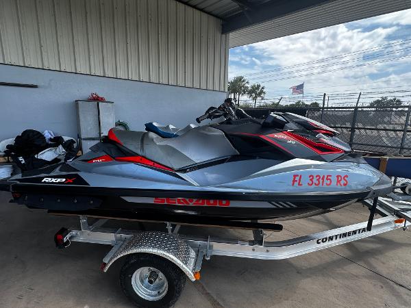 Sea-Doo RXP-X 300 2018 Sea-Doo RXP-X 300 jet ski on trailer, parked under a shelter.