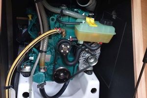 Dufour DUFOUR 360 Engine compartment of 2019 Dufour 360 yacht, showcasing mechanical components and fluid reservoirs.
