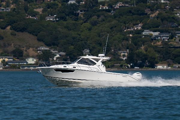 Pursuit OS 325 Offshore 2024 Pursuit OS 325 Offshore cruising on a scenic lake.