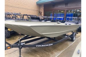 Tracker Grizzly 2072 Utility 2025 Tracker Grizzly 2072 Utility boat on trailer, displayed outdoors.