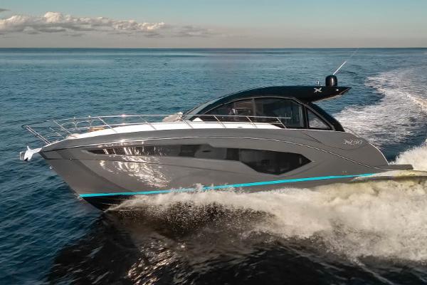 NX Boats 50 Invictus 2025 NX Boats 50 Invictus cruising on open water, showcasing sleek design and performance.