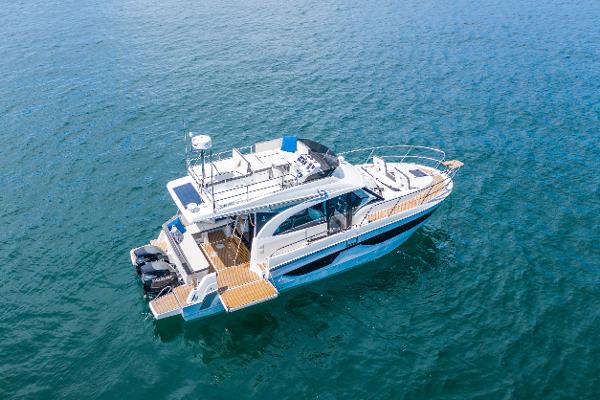 Beneteau Antares 11 Fly 2025 Beneteau Antares 11 Fly yacht on open water, aerial view.