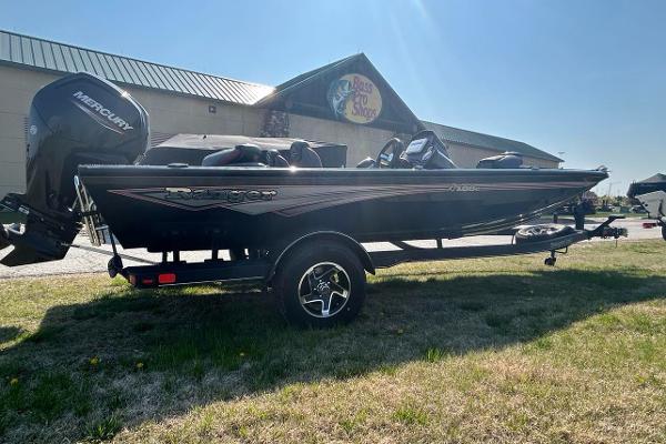 Ranger RT188C 2025 Ranger RT188C boat with Mercury engine, parked outdoors near a building.