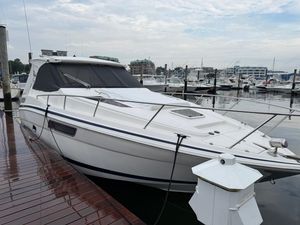 Regal 35 Sport Coupe 2016 Regal 35 Sport Coupe docked at a marina, overcast sky.