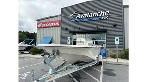 Carolina Skiff 21 LS 2025 Carolina Skiff 21 LS boat on trailer at Avalanche Motorsports dealership.