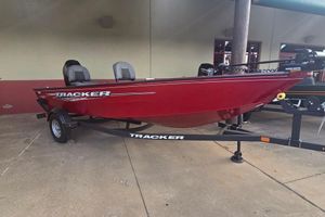 Tracker Super Guide V-16 T 2025 Tracker Super Guide V-16 T boat in red on a trailer.