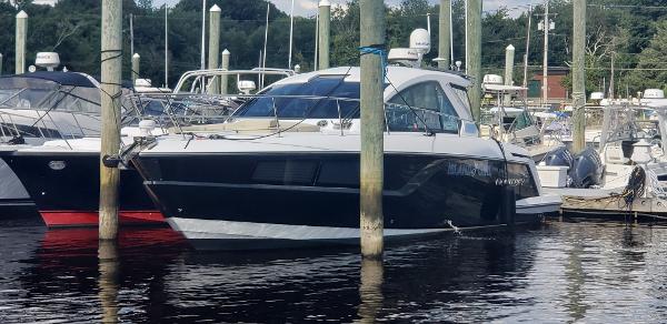 Monterey 360 Sport Coupe 2016 Monterey 360 Sport Coupe docked at a marina, surrounded by other boats.