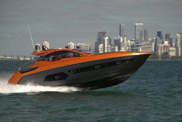 Azimut Atlantis 43 2015 Azimut Atlantis 43 yacht cruising near city skyline.