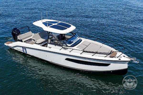 Navan S30 2025 Navan S30 boat cruising on clear blue water, featuring sleek design and modern amenities.