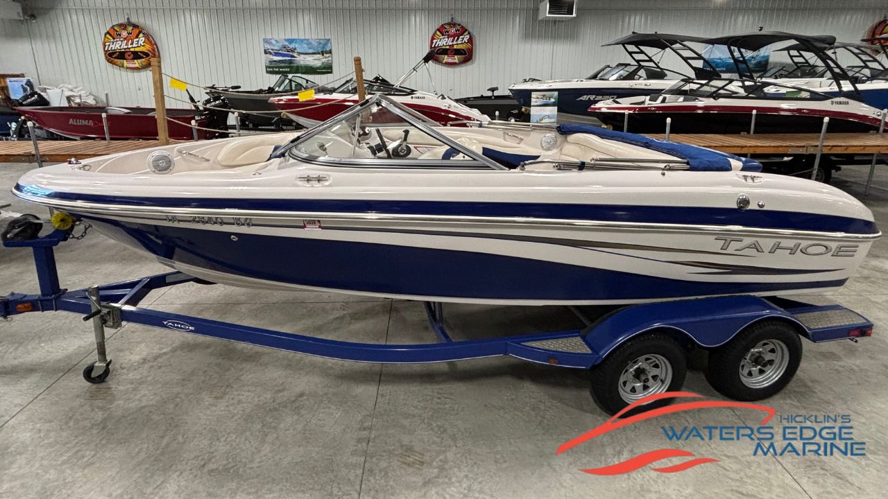 Tahoe Q7i 2010 Tahoe Q7i boat on trailer at Waters Edge Marine showroom.