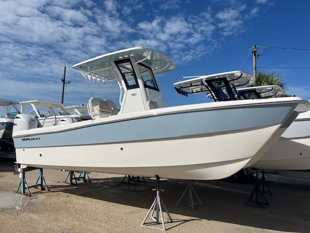 World Cat 235 CC 2025 World Cat 235 CC boat displayed on stands under a clear blue sky.
