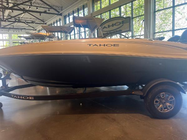 Tahoe T18 2025 Tahoe T18 boat displayed indoors on a trailer.