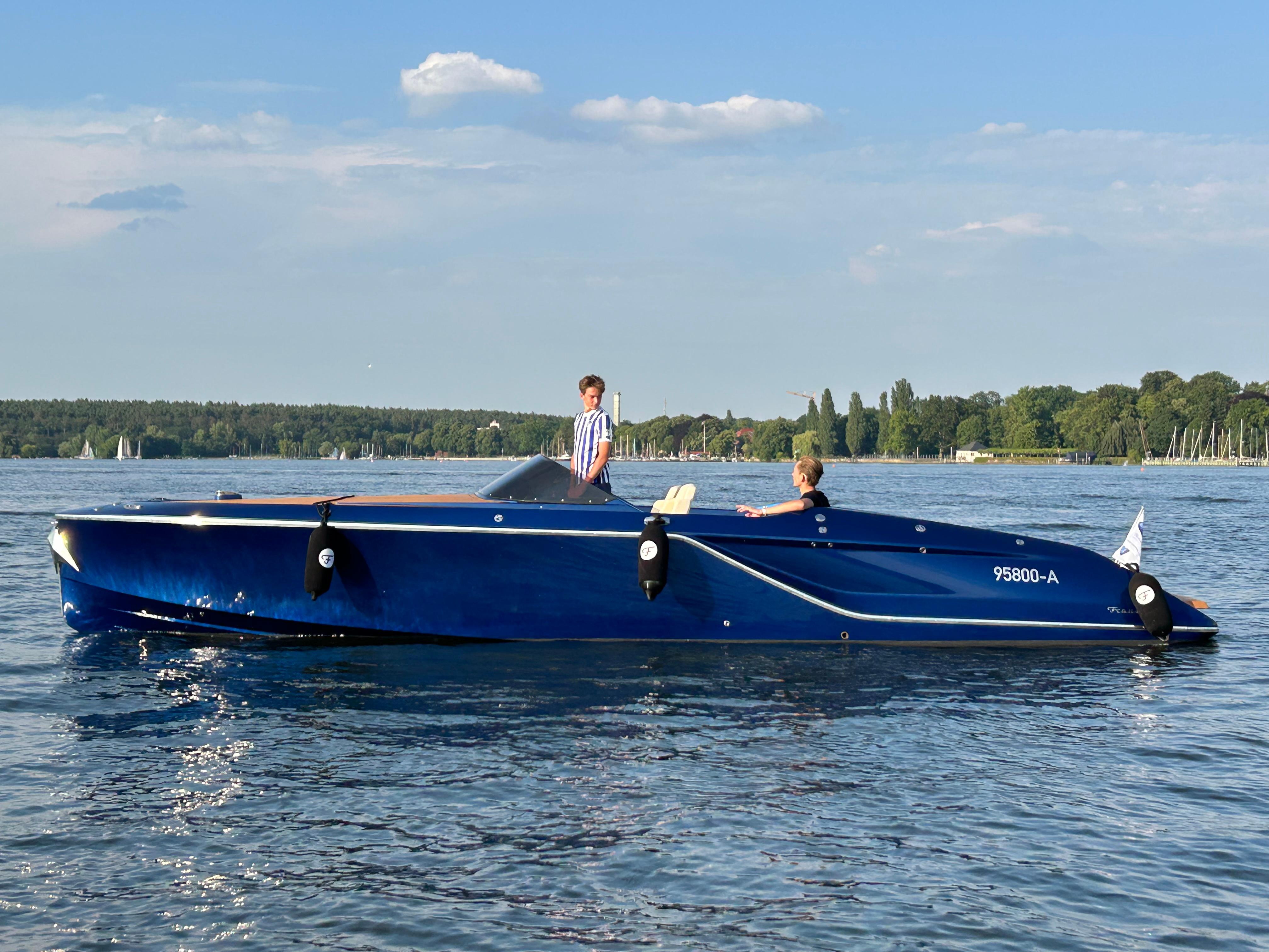 Frauscher 858 Fantom 2018 Frauscher 858 Fantom boat on a calm lake with two passengers.
