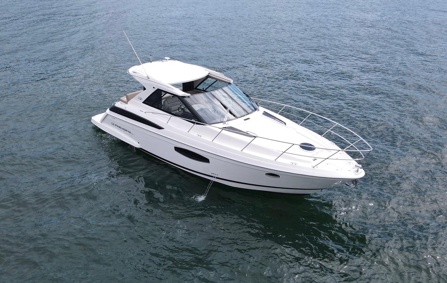 Regal 42 Sport Coupe 2016 Regal 42 Sport Coupe yacht cruising on open water.